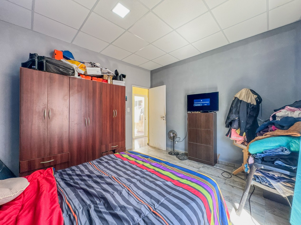 Casa amplia con 4 dormitorios y quincho en terreno de 10×40 — Ideal familia numerosa