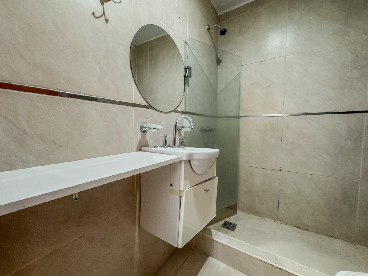 Departamento 2 Dorm + Cochera en Macrocentro | Piso 10 con Vista Abierta